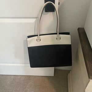 This is a Kate Spade block style laptop bag.